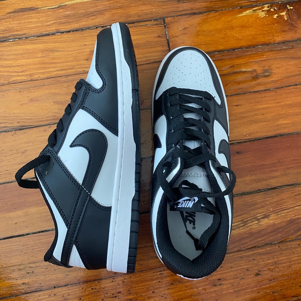 Nike Dunk Low black and white women’s sneakers, size 8.5.